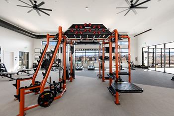 Orange weight machines in gym